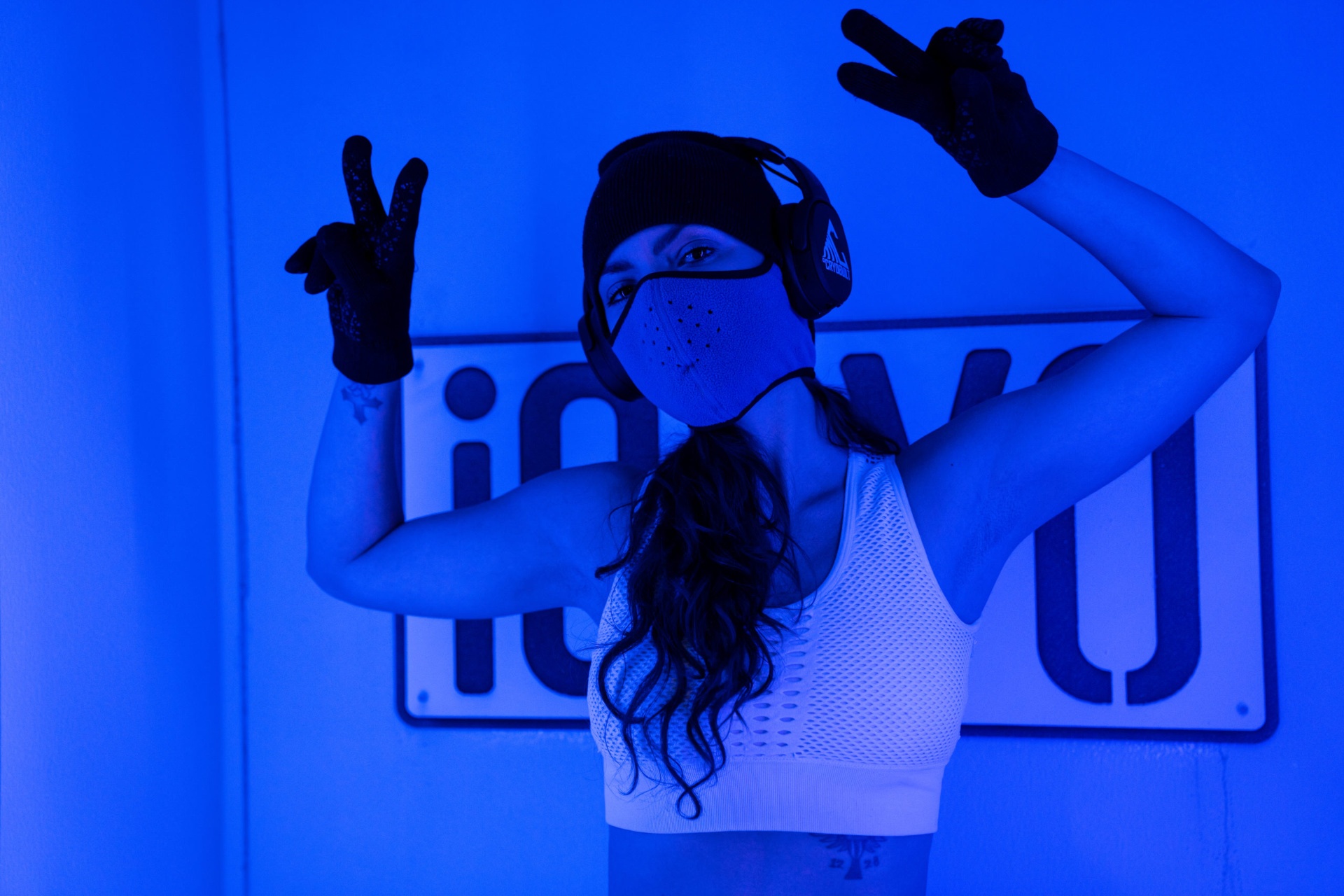 Person experiencing whole body cryotherapy session at iCRYO Guilderland